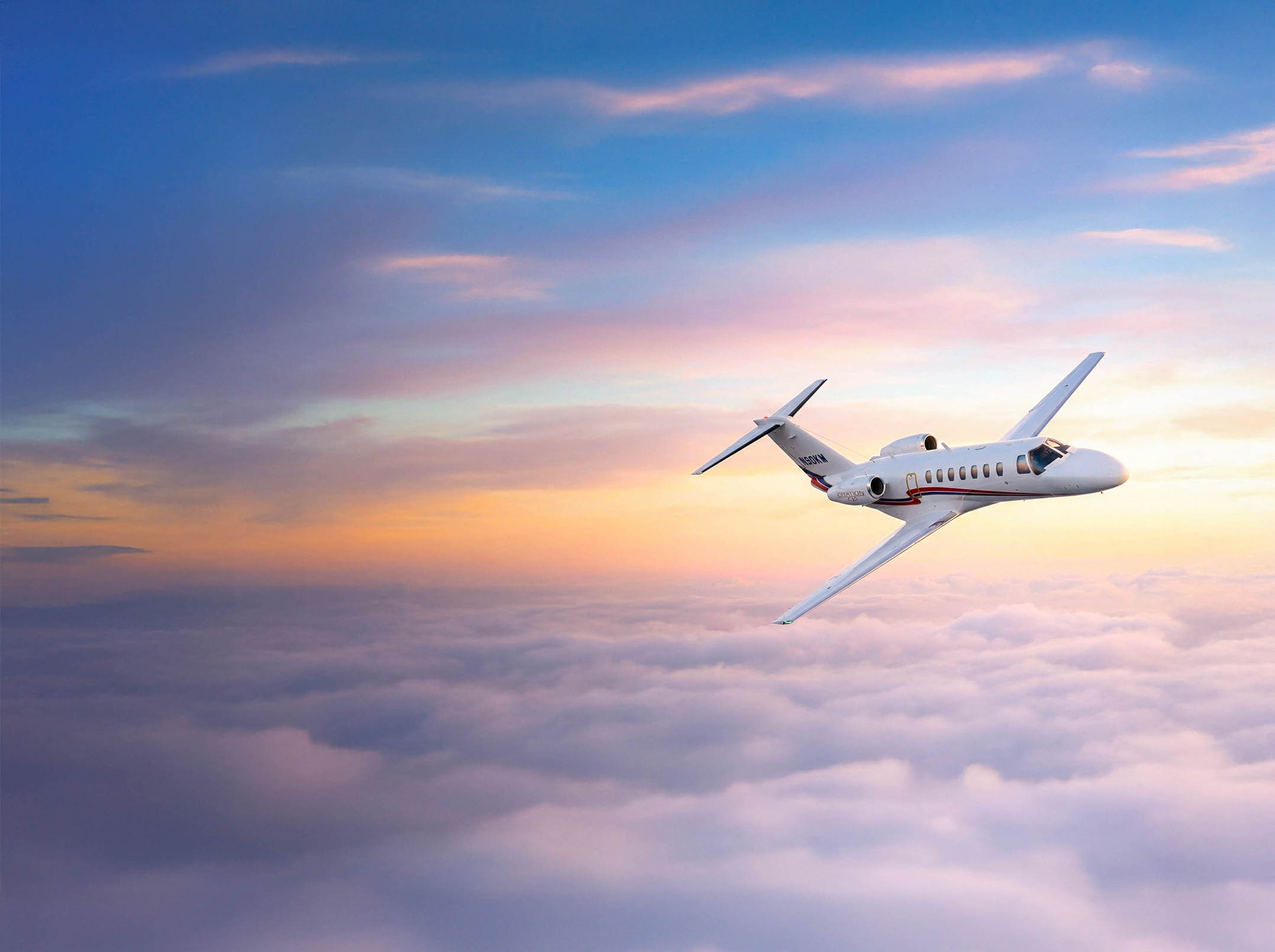 Luxury private jet at sunset