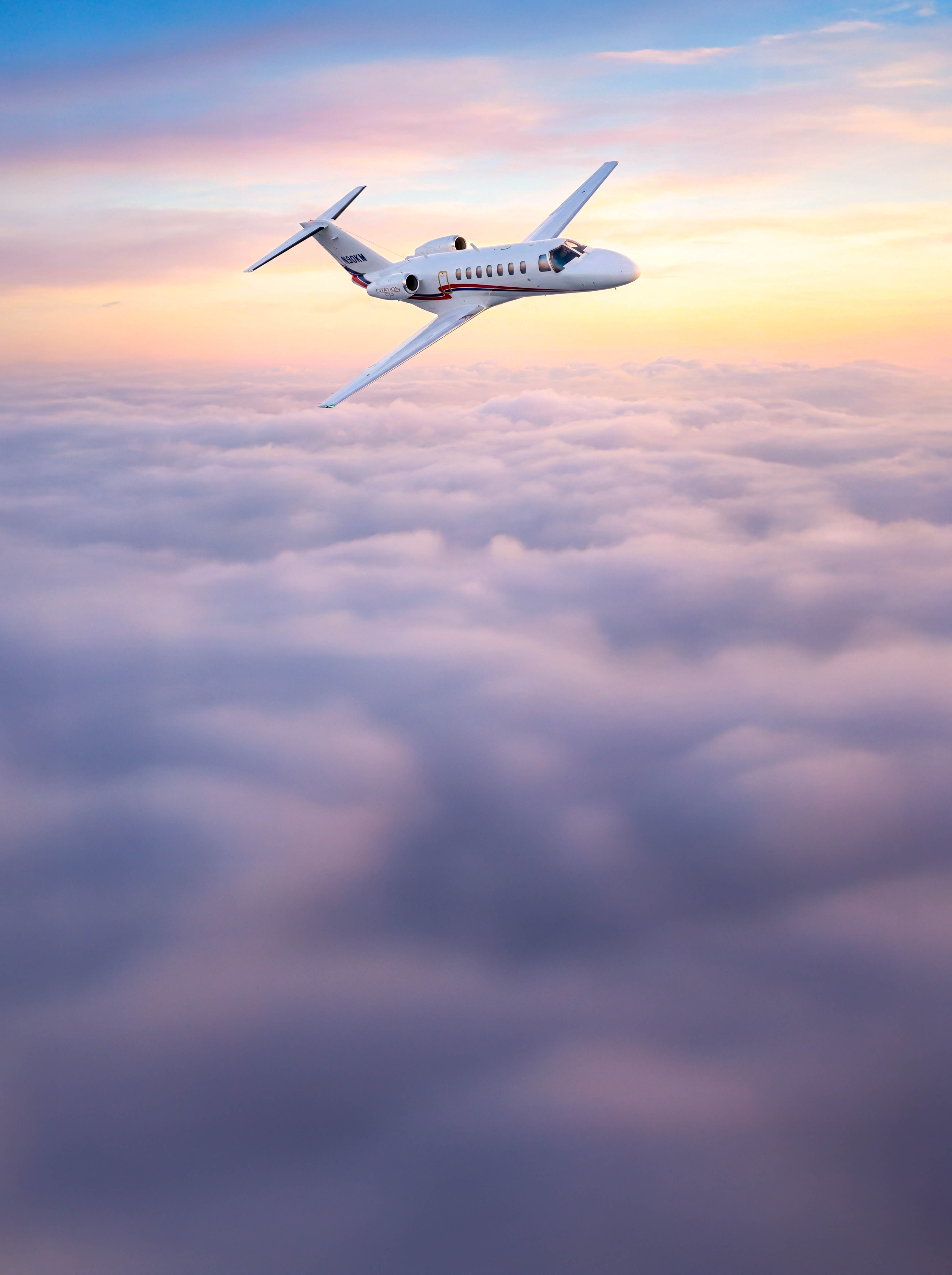 Luxury private jet at sunset